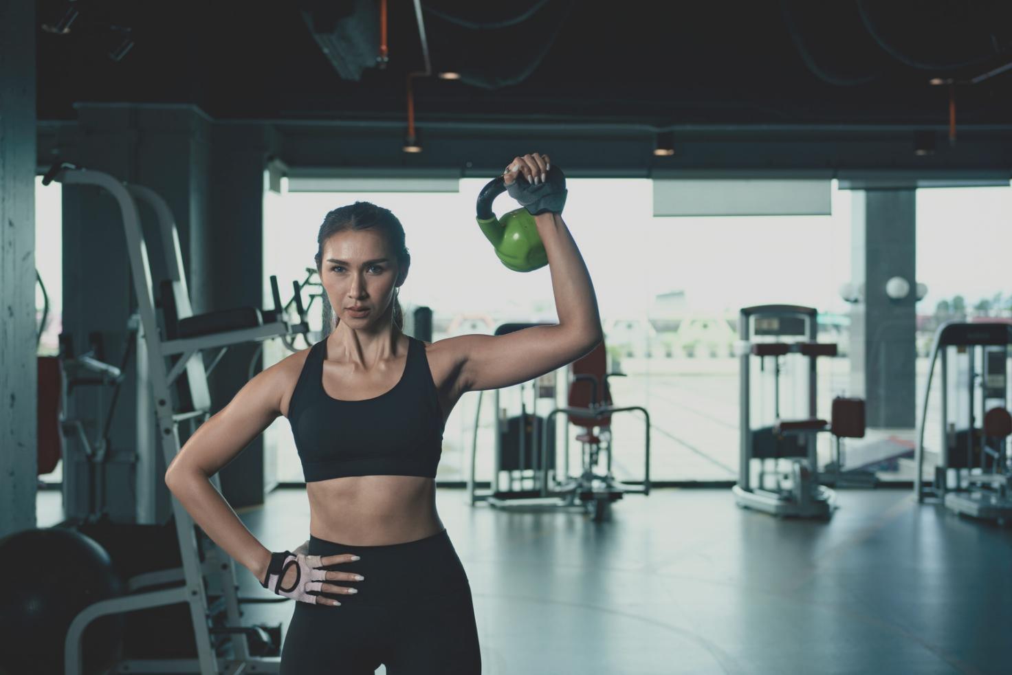 CrossFit group training with focus on proper deadlift technique